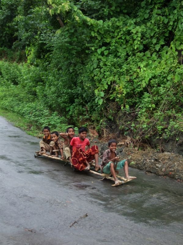 when their little wheeled sled got to the bottom of the hill, they came running back up to meet us & they were very excited. their excitement was contagious
