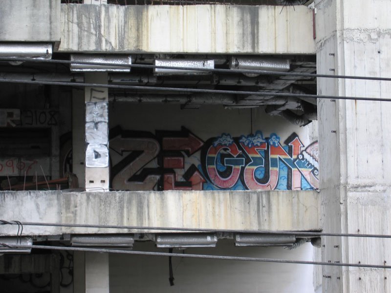 graffiti across from skytain station
