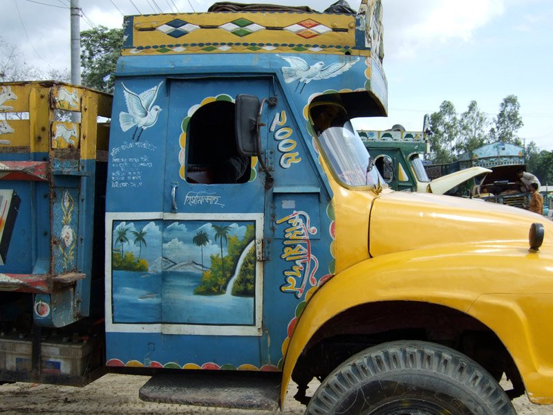 bangladeshi trucks are colourfully painted, like the rickshaws
