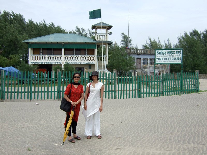 one of my young teenage cousins, Yasser, died in the ocean a few years ago. this life guard station (behind us in the photo) was built in his memory
