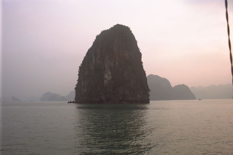 the bay with these limestone formations jutting out of the sea was amazingly beautiful.  vietnamese myth has it that halong bay was formed when a family of dragons descended to earth and spit out jewels & jade which turned into these islands.
