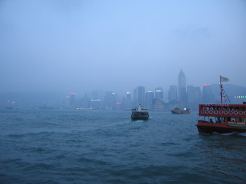on the ferry going across Victoria Harbor from Kowloon to Hong Kong island
