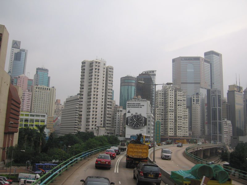 downtown as seen from the top of a double decker bus

