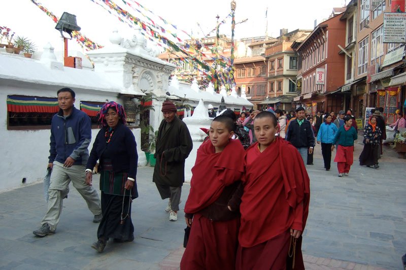 this was one of my favourite places in Kathmandu. seemingly endless streams of pilgrims, monks, buddhists circle in a clockwise direction around and around the stupa, spinning the prayer wheels, walking & praying 
