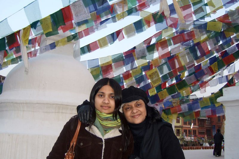 Shahrina & my mom, under the fluttering prayer flags

