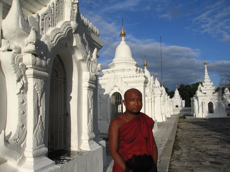 Monk at the Kuthodaw Paya - this temple complex at the base of Mandalay Hill houses the world's largest book.
