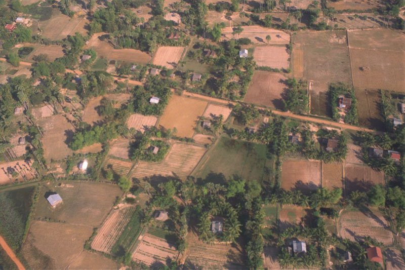 flying over the cambodian countryside.  it was winter, and that's why it looked so dry and devoid of vegetation.  in the rainy season, apparently the country is lush green
