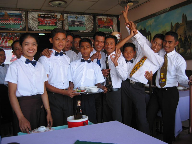 At the Pon Lok restaurant, where Chuck & I had a table on the balcony overlooking the Mekong River.  we went for a very late lunch and the place was empty by then. so we had 12 young and very happy bunch of kids serving the 2 of us!
