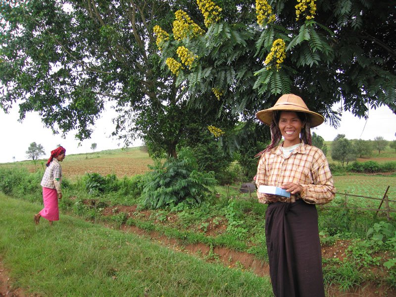 one of the field workers smiling after our driver had given her some paan
