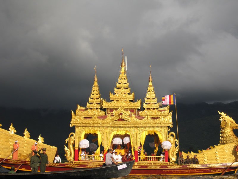 barge carries 4 buddhas, even though there are 5.  the story goes that in 1965 the barge, which was carrying all 5, capsized & sank in a storm. only 4 were recovered but back at the pagoda 5th was sitting there covered in weeds; so now he never leaves
