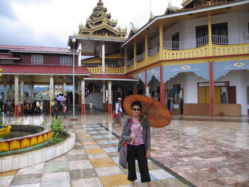 protecting myself from the rain with my parasol

