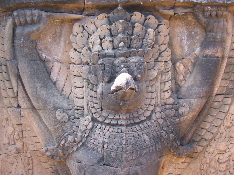 Garuda guarding the city wall at Preah Khan.  these bird men from Hindu mythology are the enemy of the serpent
