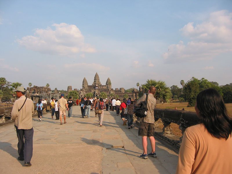 Chuck on the Naga bridge with Angkor Wat up ahead
