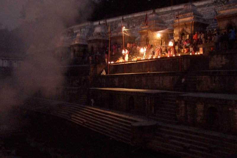 the temple complex is old and sprawling. this is looking across the narrow Bagmati river from the Arya Ghat to the terrace of the temple on the other bank
